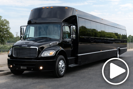 Black luxury Freightliner coach for Milwaukee corporate and group transportation.