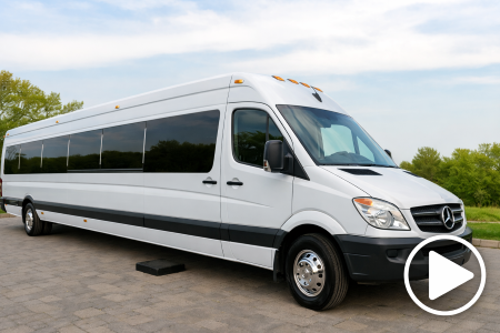 White Sprinter limousine bus for Milwaukee group travel and luxury event service.
