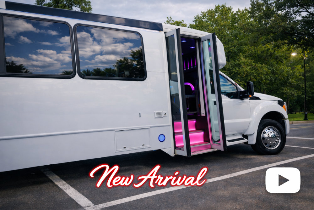 White luxury party bus with illuminated interior used for Milwaukee party bus rentals and event transportation